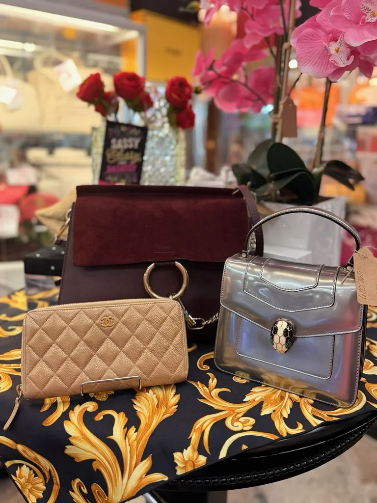 Three designer handbag bouquet display